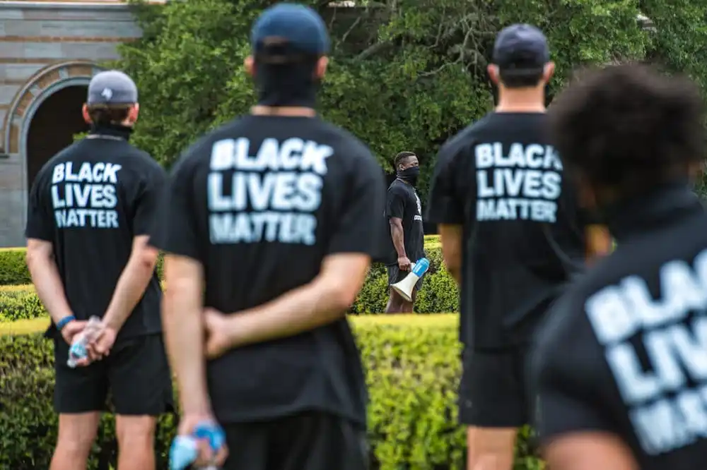 A Protest Scene Where Participants Wear T Shirts With Political Or Environmental Messages Shirt